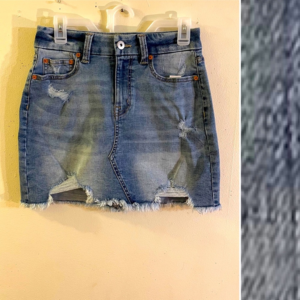 Fitted High-Rise Distressed Denim Mini Skirt